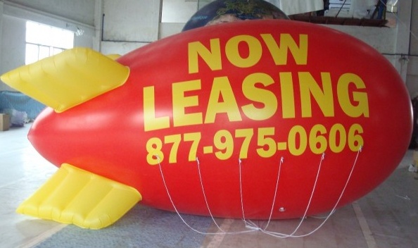 Red Advertising Now Leasing Blimp